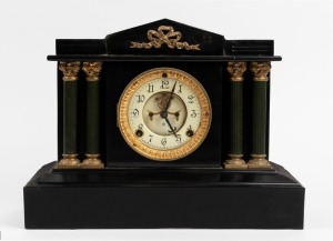 ANSONIA American mantel clock in ebonized metal case with green finished columns, open escapement and Arabic numerals, 19th century, ​​​​​​​29cm high