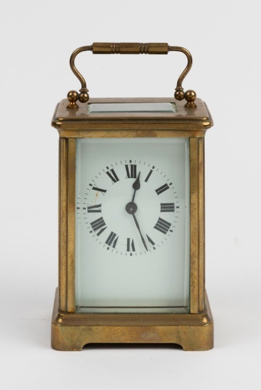 An antique French carriage clock in brass case with Roman numerals and leather travel case, 19th century, 14cm high overall