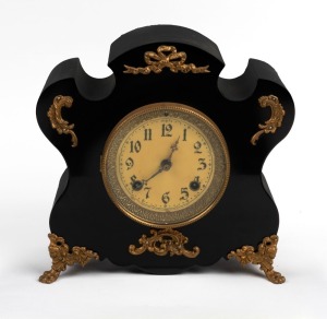 NEW HAVEN CLOCK Co. American mantel clock in a shaped ebonized metal case with gilt decorations, 8 day time and strike movement, late 19th century, ​​​​​​​28cm high