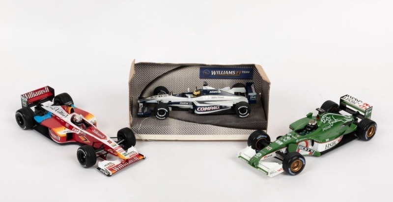 FORMULA 1 MODEL CARS: comprising MINICHAMPS Williams FW21A Zanardi 1999 Supertec; HOTWHEELS/MATTEL 2001 Jaguar R2 both 1:18 scale; also HOTWHEELS/MATTEL 1:43 c.2000 Williams BMW Compaq 9; without boxes; latter with some of original packaging. (3)