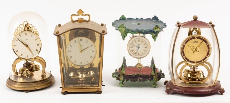 Four assorted clocks including small dome clock and lantern style clock, 20th century, ​​​​​​​the largest 20cm high