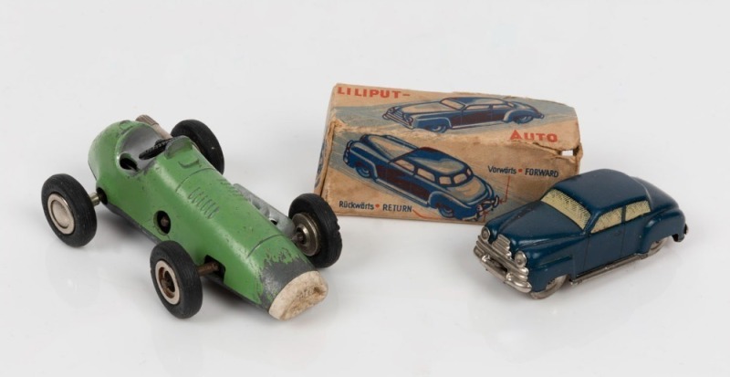 SCHUCO: Micro Racer '1040' wind-up racing car, length 9.5cm; also DISTLER 'Liliput Auto/Mighty Midget' wind-up saloon car with box; length 7cm; both items with keys; c.1950s. (2)