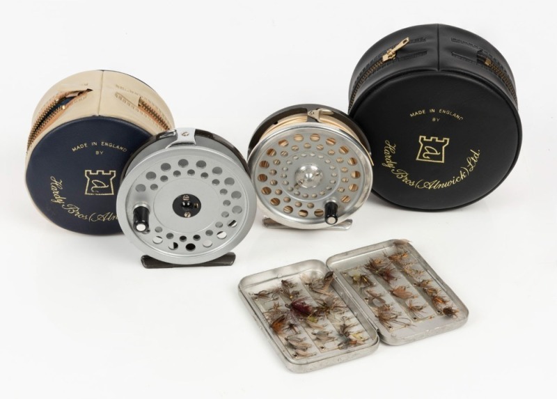 VINTAGE FISHING EQUIPMENT: with Hardy Bros (Alnwick, England) 'Marquis #6'  and 'Viscount 140 Mk II' fly fishing reels, both with original cases; also  Wheatley Silmalloy metal fly box, containing 30 fishing flies. (3 items)