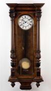 Vienna Regulator twin weight walnut cased wall clock with Roman numerals and enamel dial, 19th century, ​​​​​​​120cm high