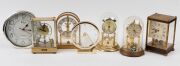 Seven assorted quartz clocks including rolling ball, dome and wall examples, 20th century, ​​​​​​​the largest 23cm high