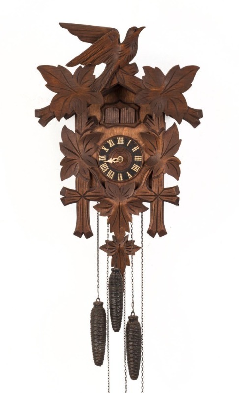 A Black Forest cuckoo wall clock with three weights, 20th century, 41cm high