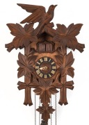 A Black Forest cuckoo wall clock with three weights, 20th century, 41cm high - 2