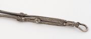 Rare antique Indian silver hookah tongs, West Gujarat origin, border with Sind, 19th century, finely engraved and crafted with two crouching tigers, 34cm long, 131 grams. PROVENANCE: Private Collection, Melbourne. Acquired in October 1988 from Framroz So - 4