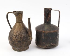A pair of Ethiopian copper alloy church ewers, circa 19th century. Ex: Seyoum Tessema, Melbourne, Australia; Ex: T. McAllister Collection, United Kingdom and Australia. 16.5cm high and 15cm high