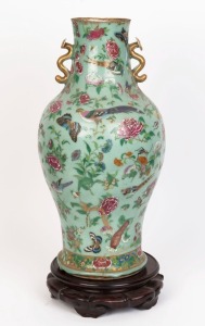An antique Chinese famille rose on celadon porcelain vase (A/F), with wooden stand, 19th century, 55cm high