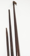 Spear thrower and two artefacts, palm wood and fibre, Papua New Guinea, the largest 200cm high - 2