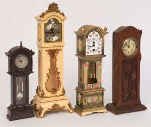 Four assorted novelty clocks in the form of miniature grandfather clocks, 20th century, ​​​​​​​the largest 32.5cm high