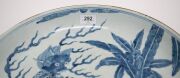 A Chinese blue and white charger with foo dog in landscape decoration, Guangxu Period late 19th century, square seal mark to base, 8cm high, 40cm diameter - 4