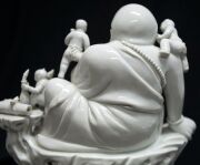 Blanc de chine Chinese porcelain statue of a Buddha surrounded by boys 19th/20th century,square seal mark to back,24.5cm high  - 10