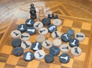 An antique walnut circular games table with chess and gaming pieces, 19th century, 74cm high 60cm diameter - 3