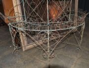 An antique English wirework plant stand, demi-lune form with three cascading shelves, late 19th century, ​​​​​​​120cm high, 112cm wide, 55cm deep - 4