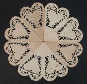 GERMAN SCHERENSCHNITTE LIEBESBRIEFE: cut paper decorated love letter, divided into 8 hearts with turtle doves above, with a central circular message area; 36cm diameter, dated 1780. - 3