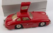 MARKLIN: 1993 wind-up 'Museumsmodell' Mercedes 300SL (model #1092), red paintwork; with key, certificate and housed in original box. - 2