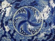 A Chinese porcelain charger profusely decorated in underglaze blue with scene of a five clawed dragon and phoenix in clouds, early 20th century, underglaze blue four character mark and incised mark to base, ​​​​​​​36.5cm diameter - 4