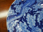 A Chinese porcelain charger profusely decorated in underglaze blue with scene of a five clawed dragon and phoenix in clouds, early 20th century, underglaze blue four character mark and incised mark to base, ​​​​​​​36.5cm diameter - 5