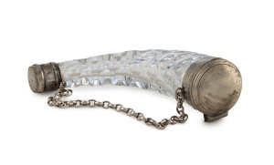 A horn shaped faceted glass scent bottle with original glass stopper, silver caps and suspension chain, circa 1875, 9.5cm high