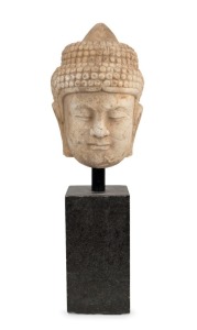 An antique Chinese carved marble Buddha head, late Ming Dynasty, 16th17th century, later stand, ​​​​​​​the head 32cm high
