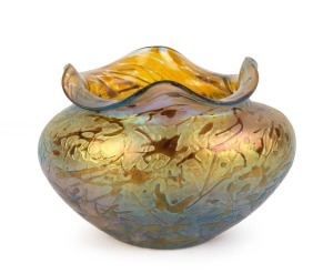 An antique Art Nouveau iridescent glass vase, late 19th century, 10cm high, 14cm wide