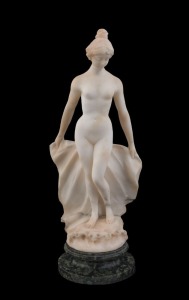 An antique Italian Carrara marble statue of a standing female nude on green marble plinth, late 19th century, signed near the base (illegible), ​​​​​​​40cm high overall