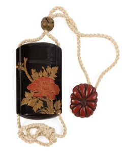 A fine Japanese black lacquered inro with decorative metal ojime and red lacquered netsuke, Meiji period, the inro 8.5cm high