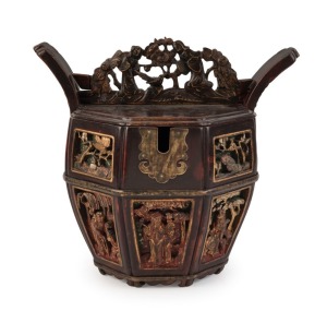 An antique Chinese eight sided box with ornate carved and gilded decoration, 19th/20th century, 32cm high, 36cm wide