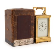 BOER WAR. Antique French repeater carriage clock in brass case with enamel dial and Roman numerals, housed in original embossed leather case, 19th century. (Movement running). Bears a silver plaque inscribed "Presented As A Mark Of Their Esteem. By The Of