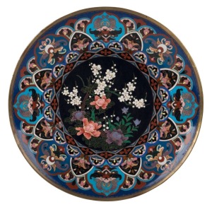 An antique Japanese cloisonne plate with floral vignette, Meiji period, 19th century, 30cm diameter