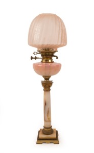 An antique banquet lamp, onyx and gilt metal column base, pink glass font, black button double burner with bayonet mount and acid etched shade, 19th century, ​​​​​​​75 cm high overall