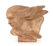 A French Art Deco terracotta bust, ​​​​​​​signed (illegible), 31cm high, 34cm long