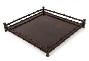 An antique Japanese rosewood square form tray with faux bamboo gallery, Meiji period, 19th/20th century, 7cm high, 38cm wide, 38cm deep