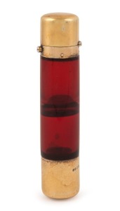 An antique English ruby glass double ended scent bottle with gilded sterling silver mounts, by SAMPSON MORDEN & CO. Birmingham, circa 1880, ​​​​​​​12.5cm long