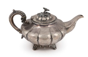 An antique Irish sterling silver teapot stamped "J.M.", Dublin, circa 1837, ​​​​​​​17cm high, 32cm wide, 970 grams