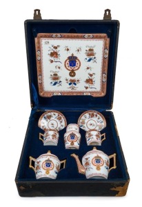 LOUIS XVIII boxed porcelain bachelor's tea set by SAMPSON of Paris, 19th century, in original plush case. Bearing an old Sotheby's lot number. the case 37cm wide
