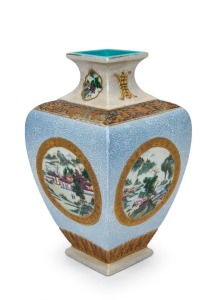A Chinese square form porcelain vase decorated with four circular landscape scenes, 20th century, impressed square Qinglong mark to base, ​​​​​​​30cm high
