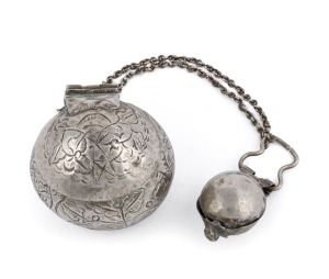 An antique Malaysian silver betelnut (sirih) set with ornate incised floral decoration. Consisting of a betel box and lime container joined with a chain. Late 19th early 20th century. Private collection, Melbourne. Acquired in The Hague, Holland in 1960. 18cm long overall