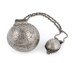An antique Malaysian silver betelnut (sirih) set with ornate incised floral decoration. Consisting of a betel box and lime container joined with a chain. Late 19th early 20th century. Private collection, Melbourne. Acquired in The Hague, Holland in 1960. 