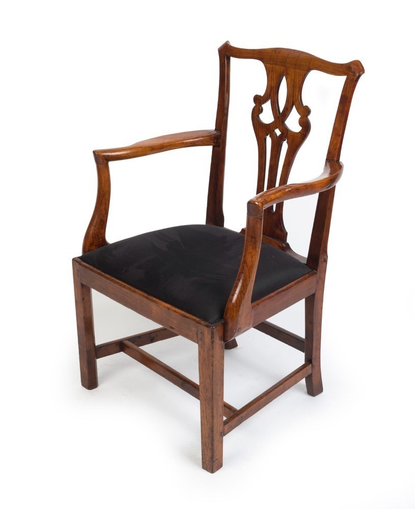 A Chippendale elm armchair with fretted vase shaped back splat