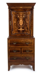 An English Sheraton revival blind bookcase with fine Adams style inlay to the upper section. The base of four drawers, the upper a well fitted secretaire, terminating with a scroll shaped apron and bracket feet, circa 1900. 203cm high, 89cm wide, 54cm dee