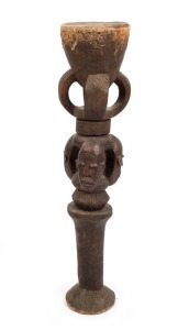 A figural drum, carved wood and hide, Makonde tribe, Southeast Tanzania, 100cm PROVENCE: the Brosset collection