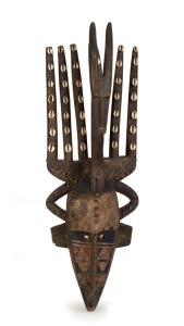 A dance mask, carved wood, shell and metal with polychrome finish, Bambara tribe, Southern Mali, 85cm high