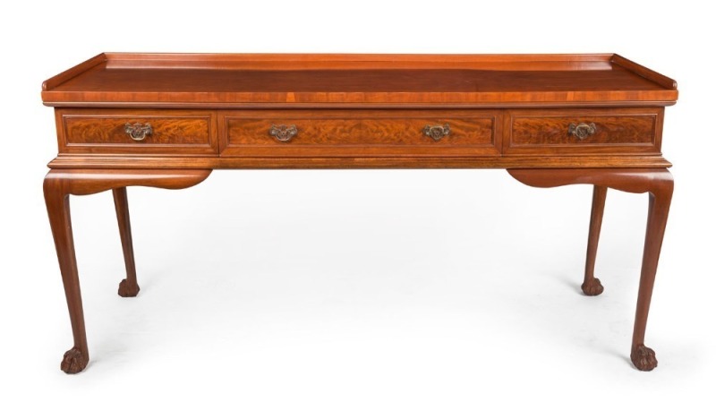 An antique mahogany three drawer servery with tapered legs and claw feet, 19th century, 84cm high, 170cm wide, 60cm deep