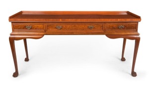 An antique mahogany three drawer servery with tapered legs and claw feet, 19th century, 84cm high, 170cm wide, 60cm deep