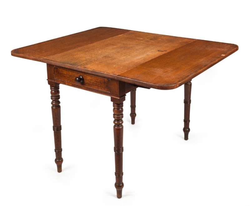 A Georgian oak drop-side occasional table with fine ring turnings and cross banded edge, early 19th century, 73cm high, 53cm (extends to 110cm) wide, 9cm deep