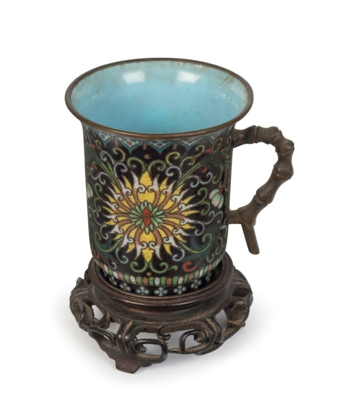 An antique Chinese cloisonne teacup on carved wooden stand, 19th century or earlier, ​​​​​​​9cm high overall