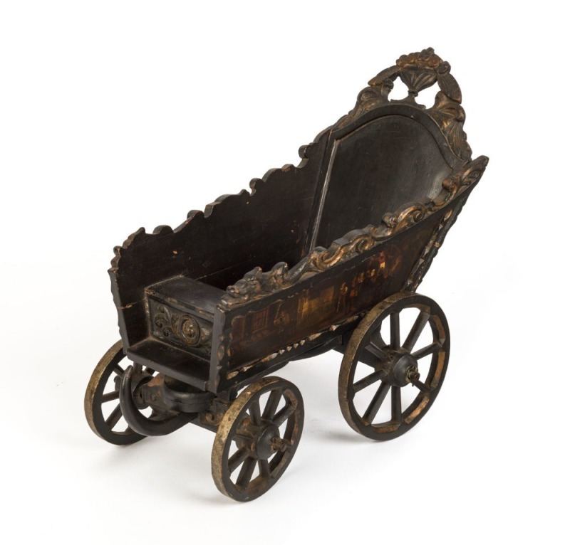 A Dutch folk art carved wood and iron toy cart, beautifully painted with ship portrait of the ZEEHOND (Sea Hound), dated 1781 and town scenes on the sides, 18th century, 30cm high, 39cm long, 18cm wide